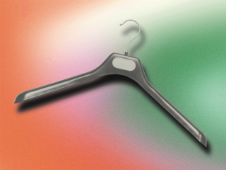 A clothing hanger on a red and green background