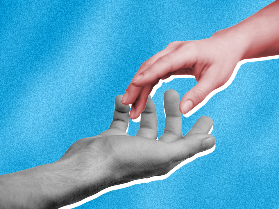 Two hands reaching for each other to symbolize how to help someone with depression