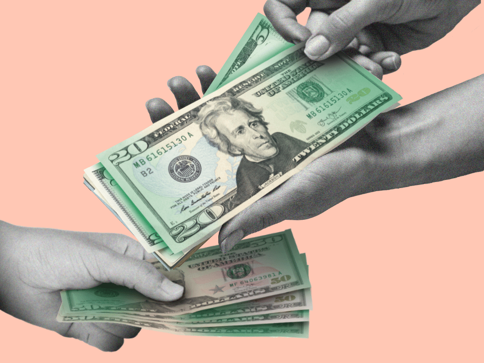 two hands with cash implying how to deal with money in relationships