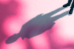 Shadow on pink background to illustrate shadow work