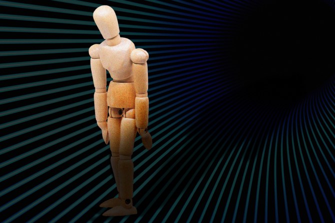 A mannequin figure draped in shadow to show what existential dread can feel like