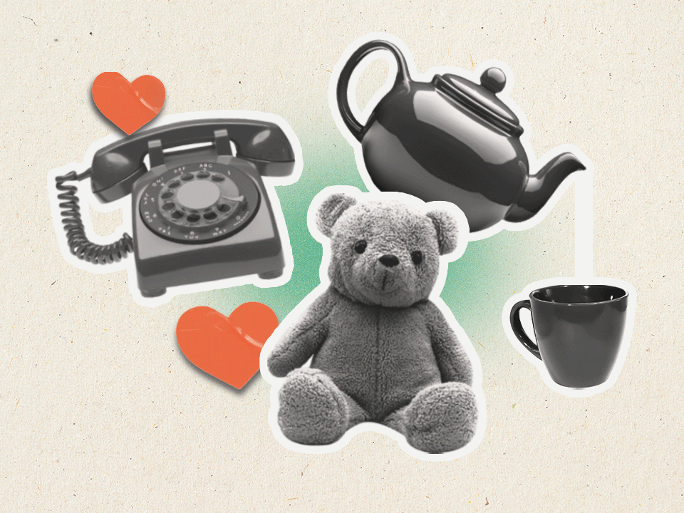 A teddy bear, phone, and teapot