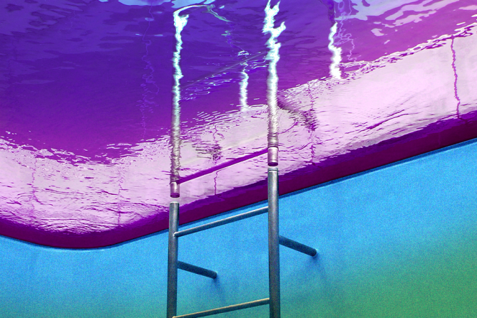 an image taken from the bottom of a pool looking upward