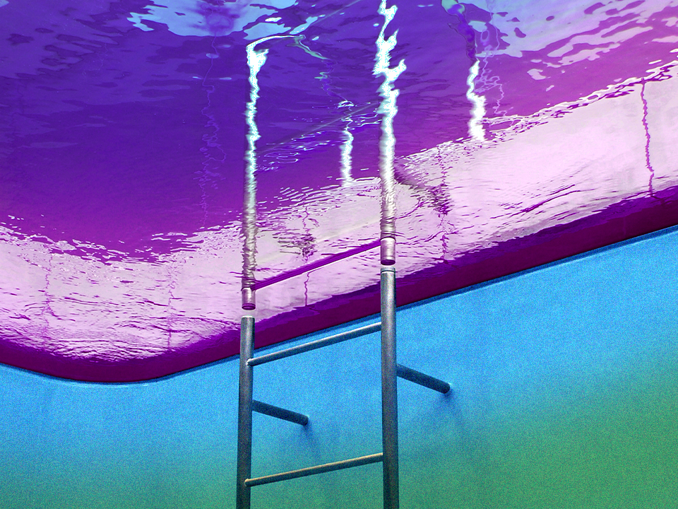 an image taken from the bottom of a pool looking upward