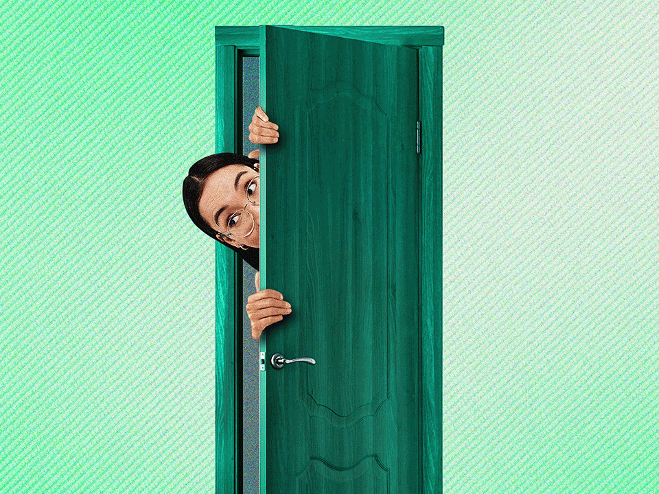 A woman peeking out from behind a door to represent avoidant personality disorder