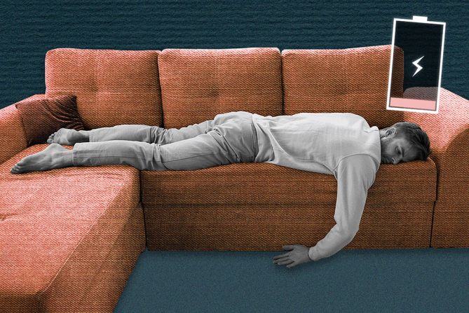 a man lying facedown on the couch because he is recovering from burnout