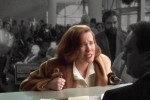 Catherine O'Hara in Home Alone talking to the airline ticket desk
