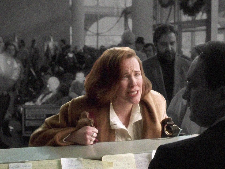 Catherine O'Hara in Home Alone talking to the airline ticket desk