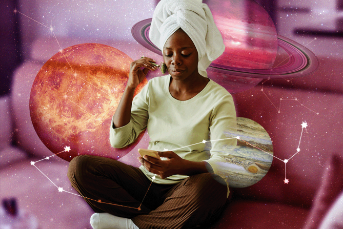 a woman listening to music with her hair in a towel, in the background there are planets