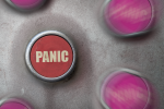a button that says "panic" on it symbolizing a panic attack