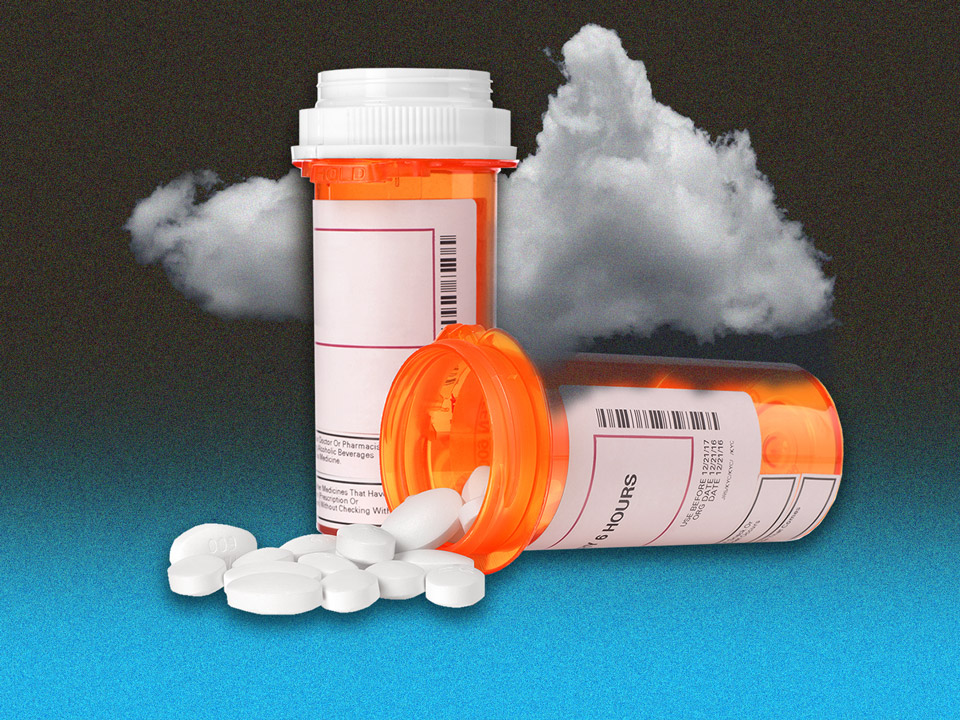 a bottle of medication for major depressive disorder in front of a cloud representing depression