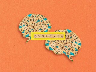 Letters scrambled in brains to represent dyslexia. Here's what dyslexia is.