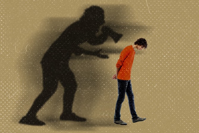 A person walking with a self-hate shadow behind them that's shouting, "I hate myself!"