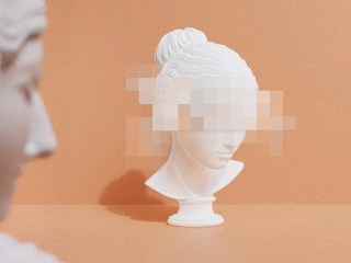 A sculpture bust of a woman with a cloud over her head
