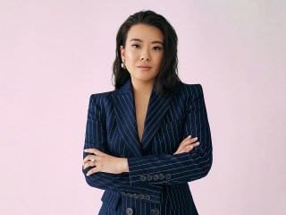 Vivian Tu standing with arm's crossed
